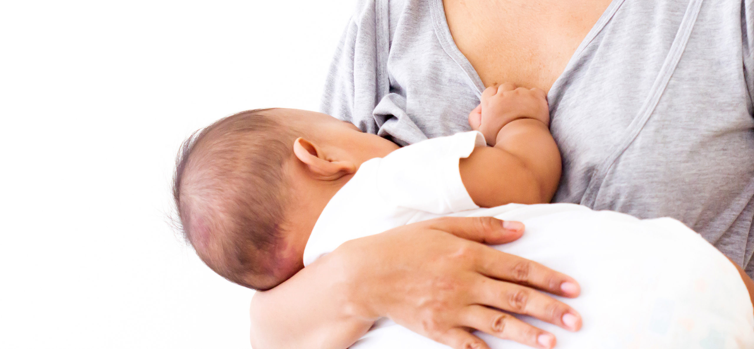 Mama karmiąca piersią dziecko – symbol Światowego Dnia Karmienia